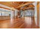 Open living room featuring wood floors, a vaulted ceiling, and a view of the water at 3567 Marion Ln., Murrells Inlet, SC 29576