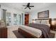 Relaxing main bedroom with access to an outdoor deck, wood furniture and soft decor at 3567 Marion Ln., Murrells Inlet, SC 29576