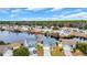 Aerial view of home in a lakeside community featuring well-maintained landscaping and community lake at 378 Thistle Ln., Myrtle Beach, SC 29579