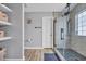 Modern bathroom featuring glass shower with marble-style tiling and open shelving for storage at 378 Thistle Ln., Myrtle Beach, SC 29579