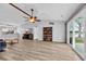 Inviting open-concept living space with recessed lighting, a vaulted ceiling, and a sliding glass door at 378 Thistle Ln., Myrtle Beach, SC 29579