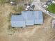 Aerial view of the home showing the metal roof and surrounding land at 4612 Red Bluff Rd., Loris, SC 29569