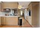 Galley-style kitchen with ample cabinets, tiled backsplash, and modern appliances at 4612 Red Bluff Rd., Loris, SC 29569