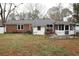 Backyard featuring a brick exterior and screened-in porch at 4649 Tarpon Bay Rd., Myrtle Beach, SC 29579