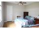 Bedroom featuring hardwood floors and a ceiling fan at 4649 Tarpon Bay Rd., Myrtle Beach, SC 29579