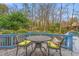 Inviting outdoor space with a wrought iron table set on a stone patio, perfect for entertaining at 4956 Dory Ct., North Myrtle Beach, SC 29582