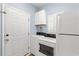 Functional laundry room with modern appliances, ample storage, and bright, clean design at 4956 Dory Ct., North Myrtle Beach, SC 29582