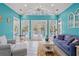 Bright sunroom with a vaulted ceiling and French doors leading to the outside deck at 4956 Dory Ct., North Myrtle Beach, SC 29582