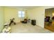 Large, empty room featuring a window and doorway into the living room at 5001 Little River Rd. # E-407, Myrtle Beach, SC 29577