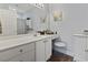 Modern bathroom with vanity area, stool and decorative mirror, providing a comfortable grooming space at 5070 Windsor Green Way # 204, Myrtle Beach, SC 29579