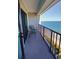 Balcony with two chairs overlooking the ocean and sandy beach at 5905 S Kings Hwy. # 1801-C, Myrtle Beach, SC 29575