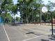 Community basketball court with hoops, lines, and shade trees at 5905 S Kings Hwy. # 1801-C, Myrtle Beach, SC 29575