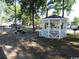 White gazebo with picnic tables in a grassy community park at 5905 S Kings Hwy. # 1801-C, Myrtle Beach, SC 29575