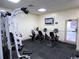 Exercise room with stationary bikes, weight machines, and television at 5905 S Kings Hwy. # 1801-C, Myrtle Beach, SC 29575