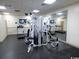 An indoor gym with weight machines, treadmills, and mirrors on the walls at 5905 S Kings Hwy. # 1801-C, Myrtle Beach, SC 29575