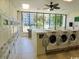 On-site laundry room featuring multiple washers and dryers at 5905 S Kings Hwy. # 1801-C, Myrtle Beach, SC 29575