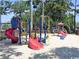 Community playground with multiple slides, climbing structures, and a sand base at 5905 S Kings Hwy. # 1801-C, Myrtle Beach, SC 29575