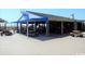 Outdoor restaurant area with tables and a beach view at 5905 S Kings Hwy. # 1801-C, Myrtle Beach, SC 29575