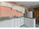 Kitchen featuring white appliances, granite countertop and storage creating functional and modern design at 5905 S Kings Hwy. # 235B, Myrtle Beach, SC 29575