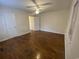 Neutral bedroom with hardwood floors and a ceiling fan at 611 E Ashland St., Andrews, SC 29510