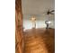 Inviting living room featuring hardwood floors and a ceiling fan at 611 E Ashland St., Andrews, SC 29510