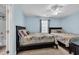 Bedroom with two twin beds, beach-themed decor, and a ceiling fan at 624-B Seabreeze Dr., Garden City Beach, SC 29576