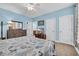 Relaxing bedroom with plenty of storage, two doors, and a TV set for entertainment at 624-B Seabreeze Dr., Garden City Beach, SC 29576