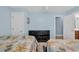 Comfortable bedroom featuring twin beds, black dresser, and light blue colored walls at 624-B Seabreeze Dr., Garden City Beach, SC 29576