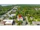 An aerial view shows the property's location near the beach and surrounding trees at 6606 Wildwood Trail # D, Myrtle Beach, SC 29572