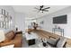 The living room flows into the dining area, with hardwood floors and neutral colors throughout the living space at 6606 Wildwood Trail # D, Myrtle Beach, SC 29572