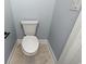 Clean white toilet situated on marble tile flooring in a well-lit space at 6606 Wildwood Trail # D, Myrtle Beach, SC 29572