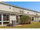 Backyard view highlighting the patio space and lawn at 677 Wilshire Ln. # 677, Murrells Inlet, SC 29576