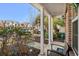 Inviting front porch with manicured landscaping and seating area at 677 Wilshire Ln. # 677, Murrells Inlet, SC 29576