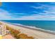 Panoramic beach view from a high-rise balcony capturing ocean, sandy beach, and scenic landscape at 6900 N Ocean Blvd. # 1536, Myrtle Beach, SC 29572