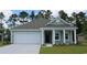 Charming single-Gathering home featuring a one car garage, and manicured lawn at 8050 Bear Claw Ct., Conway, SC 29526