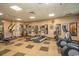 A fitness center with treadmills, weights, and elliptical machines provides residents with wellness activities at 8121 Amalfi Pl. # 4-702, Myrtle Beach, SC 29572