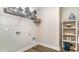 Neat closet with shelving, white trim and baseboard, wooden floor and a decorative shelf at 815 Ireland Dr., Longs, SC 29568