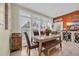 Bright dining area featuring a dining table with seating and large windows at 830 Channel Cat Cove, Murrells Inlet, SC 29576