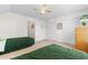 Bright bedroom featuring two twin beds, ceiling fan and double door closet at 904 Easton Ct., Myrtle Beach, SC 29579