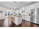 Bright kitchen features a center island, stainless steel appliances, and white cabinets at 904 Easton Ct., Myrtle Beach, SC 29579