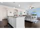 Open-concept kitchen with granite countertops, stainless steel appliances, and a view into the living room at 904 Easton Ct., Myrtle Beach, SC 29579