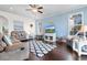 Bright living room with hardwood floors, ceiling fan, and comfortable seating at 904 Easton Ct., Myrtle Beach, SC 29579