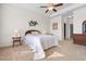 Serene main bedroom with a wicker bed frame and tropical decor at 904 Easton Ct., Myrtle Beach, SC 29579