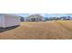 Expansive backyard with view of the home and storage shed at 925 Oak Hollow St., Longs, SC 29568