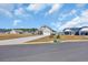 Exterior view of home with manicured landscaping in a residential community at 925 Oak Hollow St., Longs, SC 29568