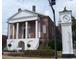 Historic brick city hall with white columns and clock tower at Tbb Lot #3 Lakeside Dr., Conway, SC 29526