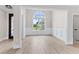 Dining area featuring a modern chandelier, large arched window, and neutral paint at Tbb Lot #3 Lakeside Dr., Conway, SC 29526