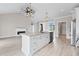 An island kitchen featuring a granite countertop, undermount sink, and white cabinetry at Tbb Lot #3 Lakeside Dr., Conway, SC 29526