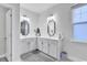 Bright bathroom with double vanities, modern mirrors, and stylish decor at 1012 Baker Creek Loop, Myrtle Beach, SC 29579