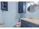 This bathroom features a beautiful vanity, mirror, and hardware at 1032 N Ocean Blvd., Surfside Beach, SC 29575